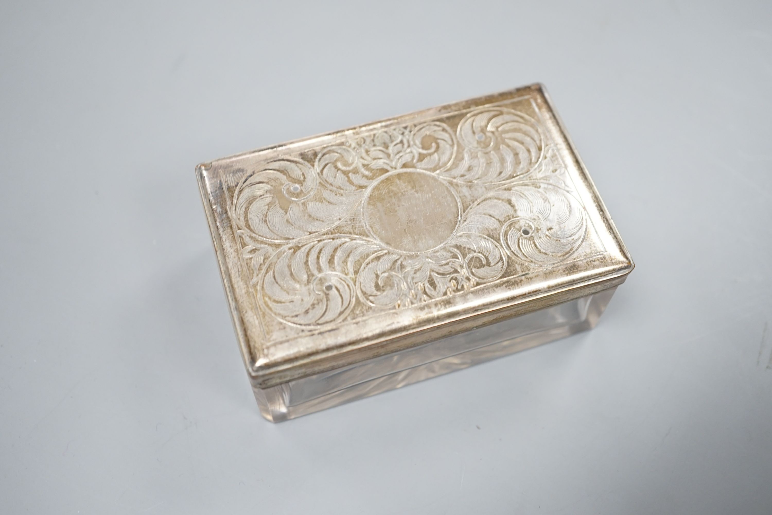 A Victorian brass mounted burr walnut toilet box, fitted with glass jars with electroplated tops, Width 30 cms. Ivory mounted items included